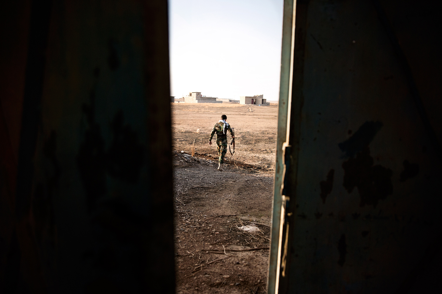 Peshmerga soldier walking in Kurdistan, Iraq.